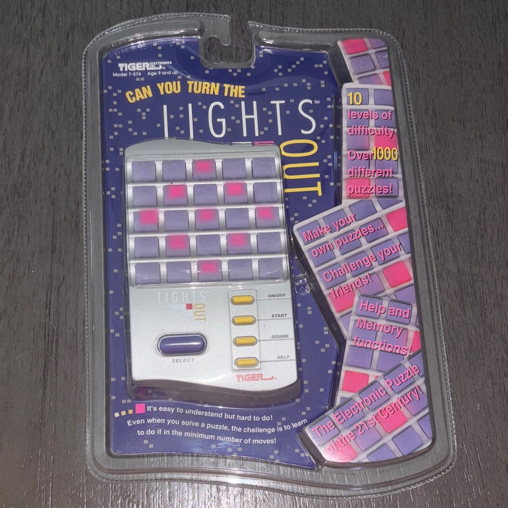 Tiger Electronics Lights Out Puzzle Game - Gray and Purple